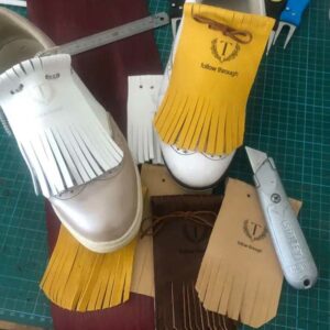 https://tfta20.co.za/wp-content/uploads/2022/05/Tassel-Shoe-Covers-300x300.jpg